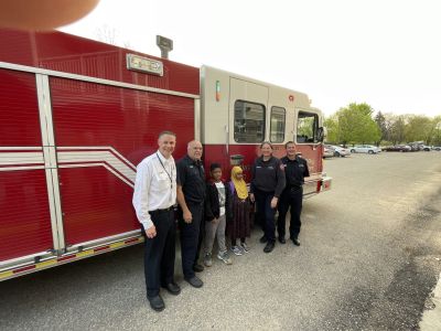 Kids ride to school on Fire Truck