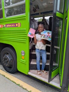 LEAF PAKRAT BUS with child in doorway