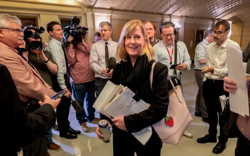 Melissa Hortman with documents-Photo credit: MinnPost /Tom Olmscheid