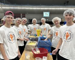 <p class="title">Title: Helping Hands</p>
Photo by: Beth Fenstad Helping Hands