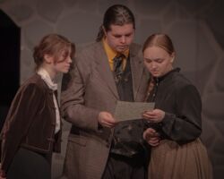 <p class="title">Title: Apollo's "Woman in White" Performance-3</p>
Photo by: Raven Karnik Apollo's "Woman in White" Performance