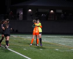 <p class="title">Title: Varsity Debut</p>
Photo by: Elizabeth Hennen Varsity Debut