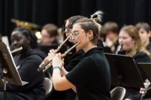 students playing in an orchestra